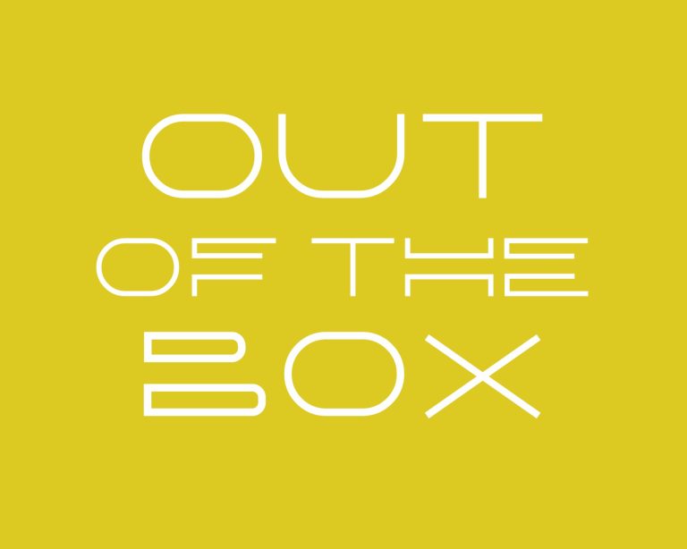 Text in moderner Schrift auf gelbem Hintergrund: "OUT OF THE BOX".